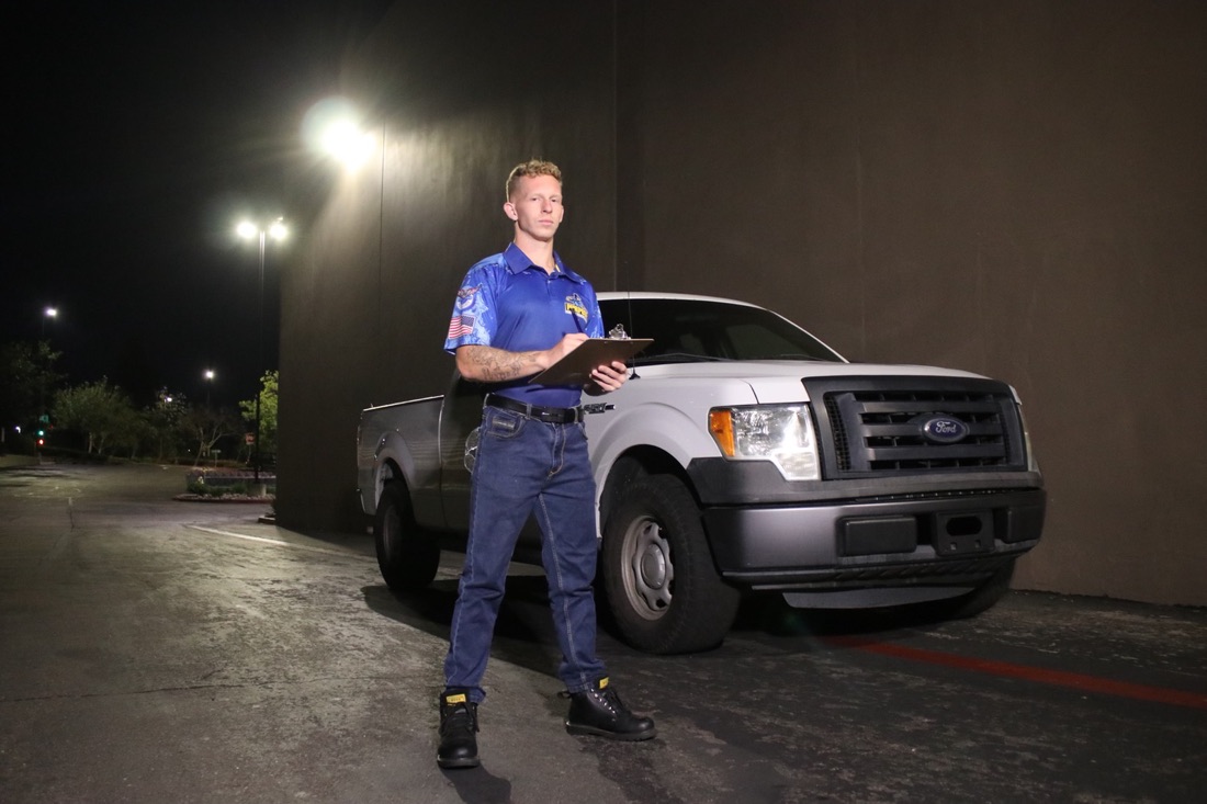 Purpose Pressure Washing team member beside the company work truck
